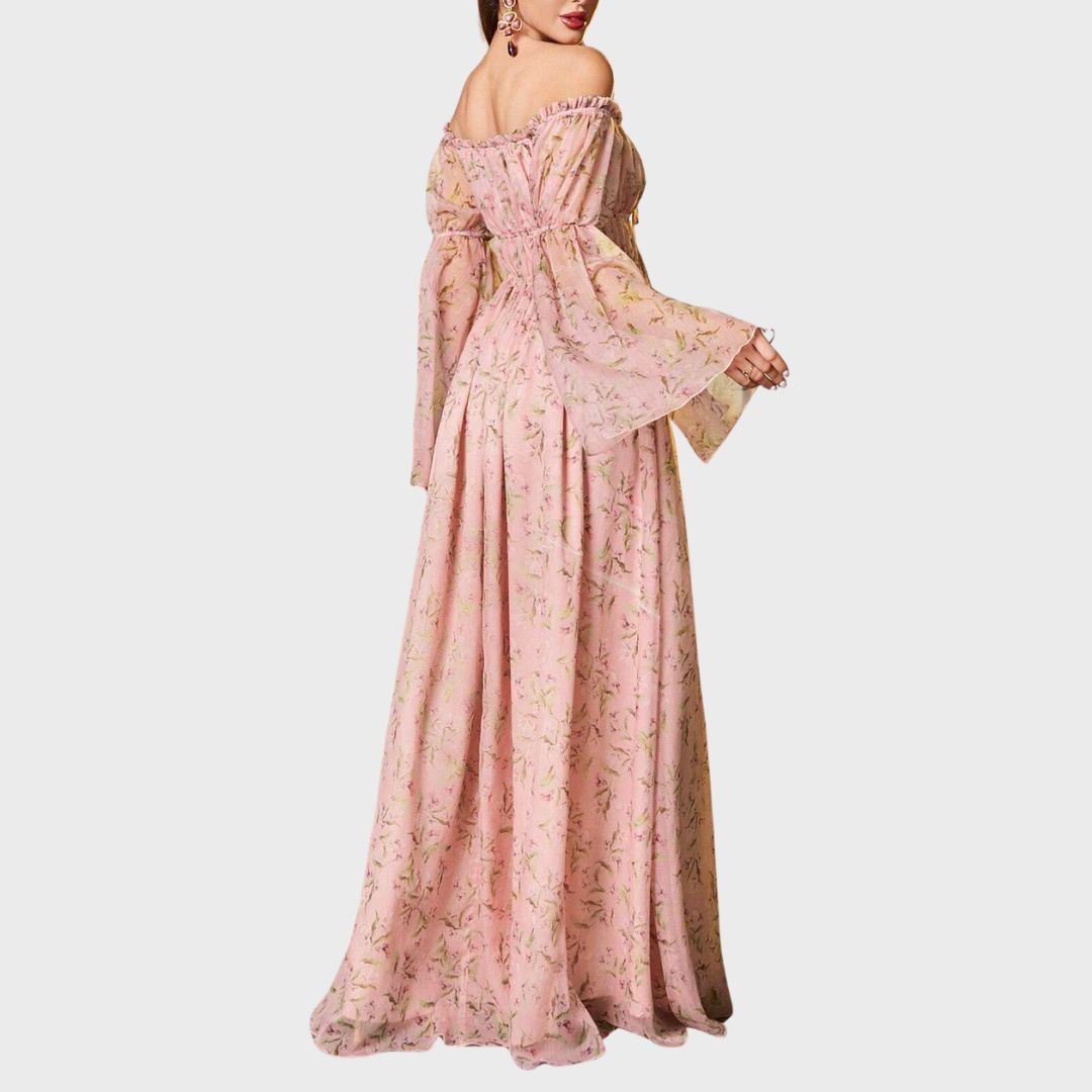 Boho Romance: Ljusrosa blommig maxiklänning med dramatiska ärmar