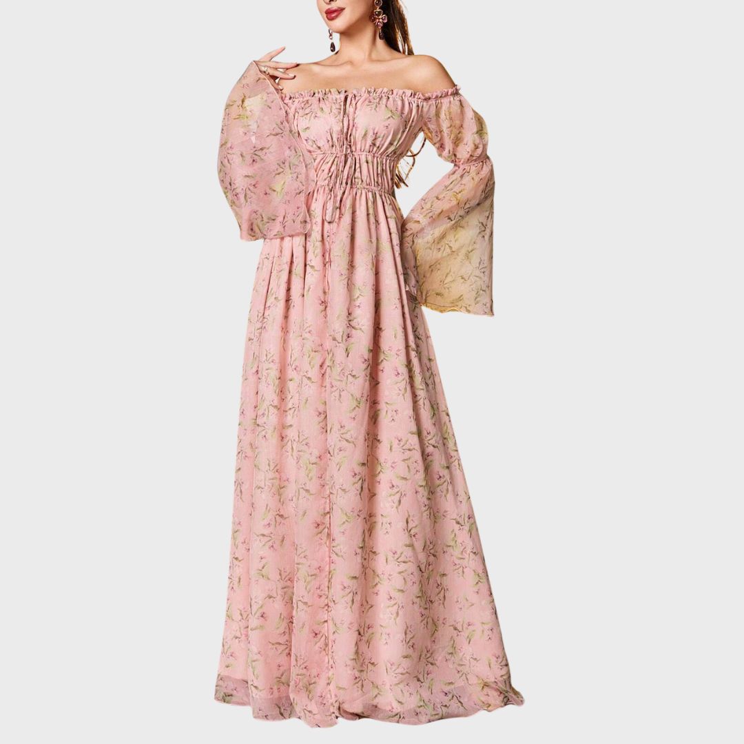 Boho Romance: Ljusrosa blommig maxiklänning med dramatiska ärmar